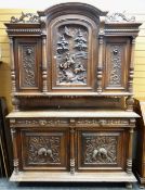 IMPRESSIVE 19TH CENTURY FLEMISH WALNUT CABINET, arched top with carved doors divided by fluted
