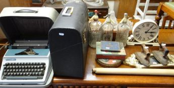 ASSORTED VINTAGE COLLECTABLES including three soda siphons, Boots Model 42 typewriter, printed tins,