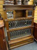 GLOBE-WERNICKE OAK SECTIONAL BOOKCASE of three-tiers on drawer base, 90cms wide