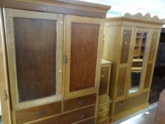 LATE VICTORIAN OAK BEDROOM SUITE comprising two mirrored wardrobes, side cabinet and a similar