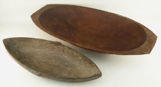 TAMI ISLAND OVAL FEAST BOWL, 68cms long and a Massim feast bowl, 86cms (2)