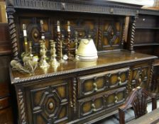 EARLY 20TH CENTURY JACOBEAN-STYLE CARVED OAK SIDEBOARD with stage back, 183 x 61 x 174cms