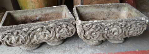 PAIR OF DECORATIVE MOULDED CONCRETE PLANTERS decorated with Renaissance-style figural lattice