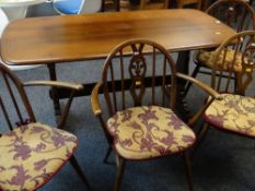 ERCOL BROWN OAK TRESTLE TABLE & FOUR STICK BACK WINDSOR CHAIRS