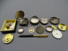 SILVER WATCH CASES, movement parts and dials, with a 1928 silver football medal and World War I