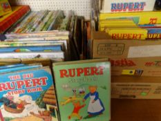 GOOD QUANTITY OF RUPERT THE BEAR vintage books and albums with a selection of videos