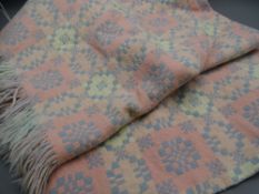 TRADITIONAL WELSH WOOLLEN BLANKET in pink and blue reversible tones with tasselled ends, 215 x