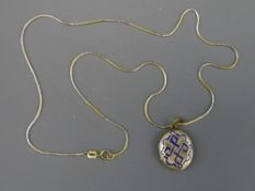 FOURTEEN CARAT GOLD FINE CHAIN with enamelled yellow metal locket, 4grms (chain only)