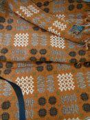 CLASSIC WELSH WOOLLEN BLANKET with 'Derw' label, traditional reverse pattern on a rust ground, 228 x