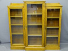 OAK THREE DOOR GLASS FRONTED BOOKCASES, a pair, stepped tops with shaped back rails, interior