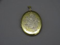 LARGE GILDED SILVER LOCKET PENDANT with engraved flowers design, Birmingham 1976, maker 'J S',