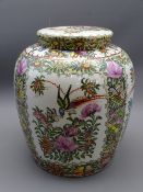 FAMILLE ROSE GINGER JAR & COVER, 19th century, 27cms overall H, having floral bordered panels of
