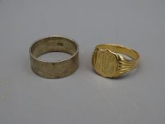 NINE CARAT GOLD SIGNET RING, 4.8grms and a wide 925 silver wedding band, 5.6grms