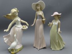 TWO NAO FIGURINES and another similar