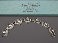 DANISH SILVER BRACELET of Viking boats design, maker Carl Ove Frydensberg, marked 'Sterling, COF,