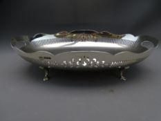 SILVER OVAL FRUIT BOWL with pierced edge and scalloped rim, standing on four pad feet, 357grms, 24.