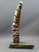 TERRACOTTA & WELSH SLATE SCULPTURE, titled 'Pop One Out Until You Drop' by Pea Restall RCA