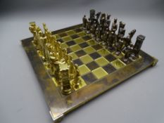 LACQUERED BRASS CHESS BOARD and cast metal bronze and brass effect chess set