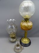 VICTORIAN OIL LAMP with mottled glass font and globular shade plus two other smaller