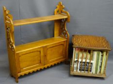 TABLE TOP OAK REVOLVING BOOK STAND & CONTENTS with a circa 1900 oak wall cabinet, 32.5cms H, 34.5cms