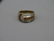 9CT GOLD ART DECO BUCKLE FORM RING with rubies and diamonds, 5.7grms