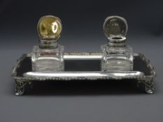EDWARDIAN SILVER PARTNER INKSTAND with rope and swags border and on four raised fretwork legs, two