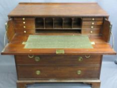 CIRCA 1840 MAHOGANY SECRETAIRE CHEST having ring pull brassware to a drop down dummy drawer front