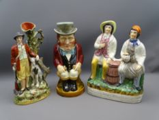 SARREGUEMINES TOBY JUG and two Staffordshire figurines including an early spillholder of a