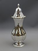 SILVER SUGAR CASTER of fluted baluster form, Birmingham 1957, maker Hampton Utilities, 6 troy ozs