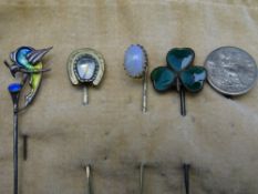 SELECTION OF FIVE STICK LAPEL PINS to include enamelled, Irish, fireopal, citrine, 1843 coin
