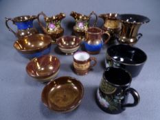 COPPER LUSTRE - approximately 6 jugs, 3 basins and a mug and a black lustre cream jug and sugar