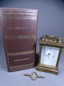 MATTHEW NORMAN BRASS ENCASED CARRIAGE CLOCK of fine quality with Corinthian corner columns, swing