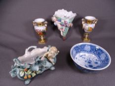 CONTINENTAL CHINA - two cherubic and floral bough pots and small oval bowl, a pair of square based