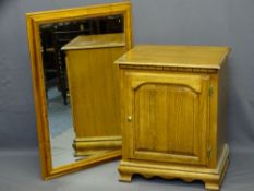 SINGLE DOOR LIFT-TOP STORAGE CABINET and a pine framed bevelled edged wall mirror, 77.5cms H,