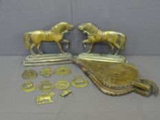 OBLONG BASED BRASS STRIDING HORSE DOORSTOPS, a pair, a small quantity of loose horse brasses and a