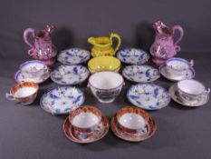 OLD LUSTREWARE - a 19th century yellow lustre jug with floral banding and a similar bowl, a pair