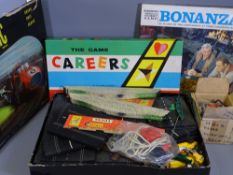 VINTAGE SCALEXTRIC SET, boxed with transformer and two Waddingtons board games, titled 'The Game