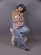 NAO PORCELAIN FIGURINE OF A YOUNG WOMAN & CHILD, matt finish glazes, dated 1992, 39cms H