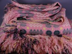 PAIR OF PINK GROUND PATTERNED WELSH BLANKETS, each bearing the 'Derw Mill' label