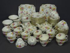 NEW CHELSEA STAFFORDSHIRE CHINA TEAWARE, white ground with floral decoration - a large parcel