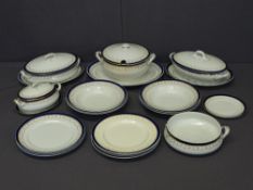 STAFFORDSHIRE DINNERWARE, white ground, blue and gilt decoration, a quantity including tureens and