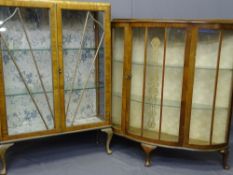 TWO VINTAGE WALNUT CHINA DISPLAY CABINETS, 121.5cms H, 87.5cms W, 29cms D the largest, 111cms H,