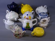 VINTAGE & LATER TEAPOT COLLECTION including an early blue and white example having later additions