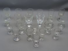 VICTORIAN GLASS RUMMERS, approximately twenty two, majority with pontil marks