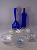 PETER TYSOE IRIDESCENT STUDIO GLASSWARE, three items to include 22cms and 19cms diameter bowls, a