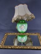 GILT FRAMED BEVELLED WALL MIRROR and a table lamp having a green pottery floral Crown Devon base