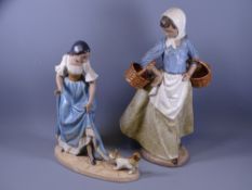 TWO NAO PORCELAIN LARGE FIGURINES, matt finish glazes to young girl carrying two baskets, dated