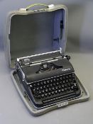 OLYMPIA DELUXE CASED VINTAGE TYPEWRITER made in Western Germany