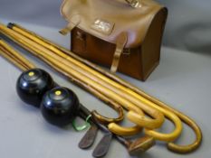 THOMAS TAYLOR, GLASGOW EBONIZED CROWN GREEN BOWLS, a pair, in carry case, three wooden shafted