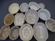 19TH CENTURY & LATER POTTERY JELLY MOULDS, 13 various with impressions of fruit and flowers ETC